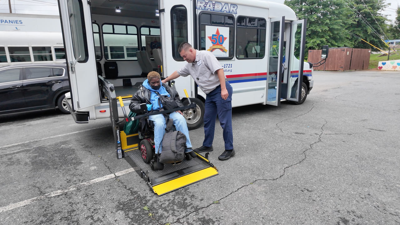 wheelchair user exiting radar bus