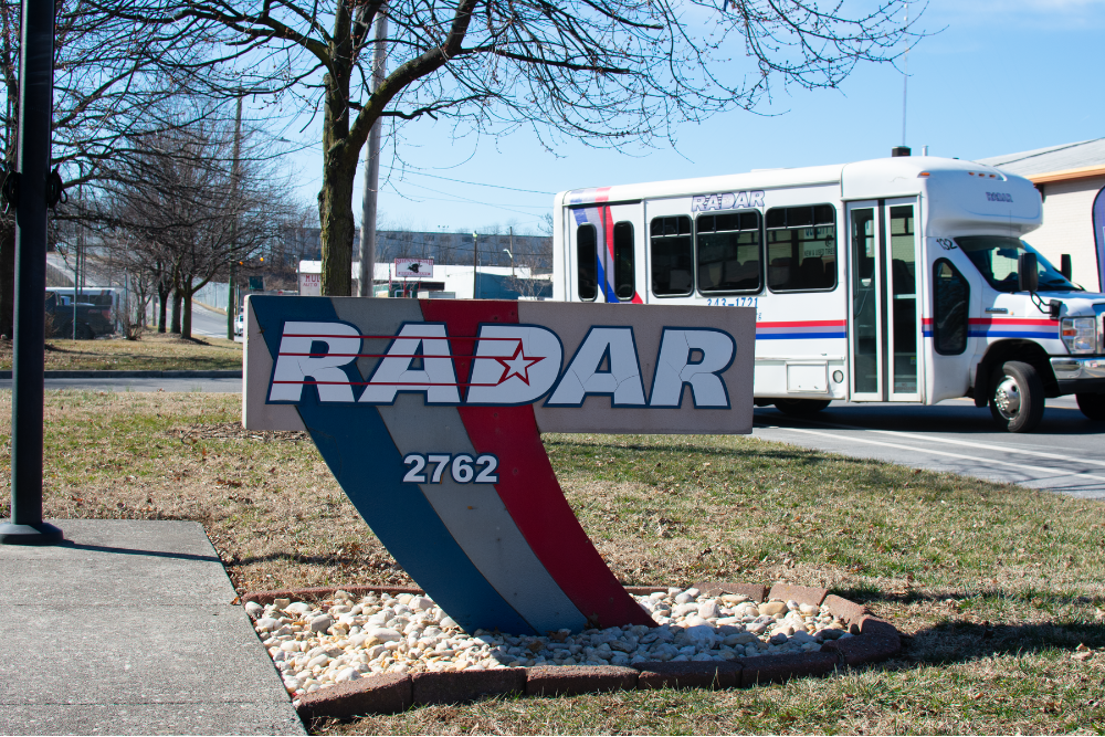 RADAR bus passing the front sign